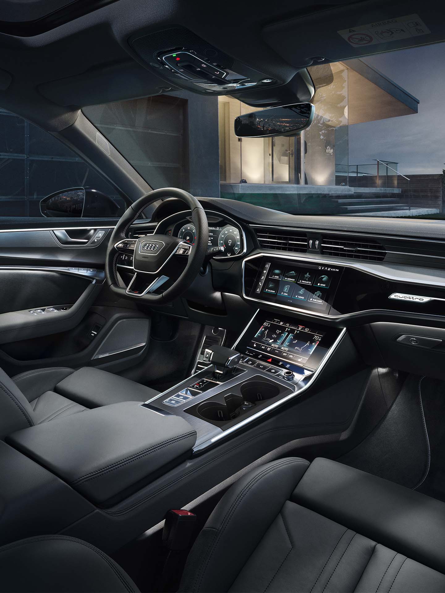 Foto del interior de un Audi A6 Avant TFSIe con el pack de iluminación ambiente plus.  